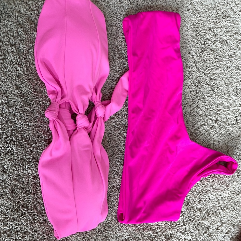 Two pink bathing suit tops